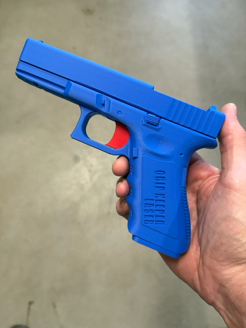 Grip Keeper Laser Trainer – Trigger-Activated Laser Training Pistol