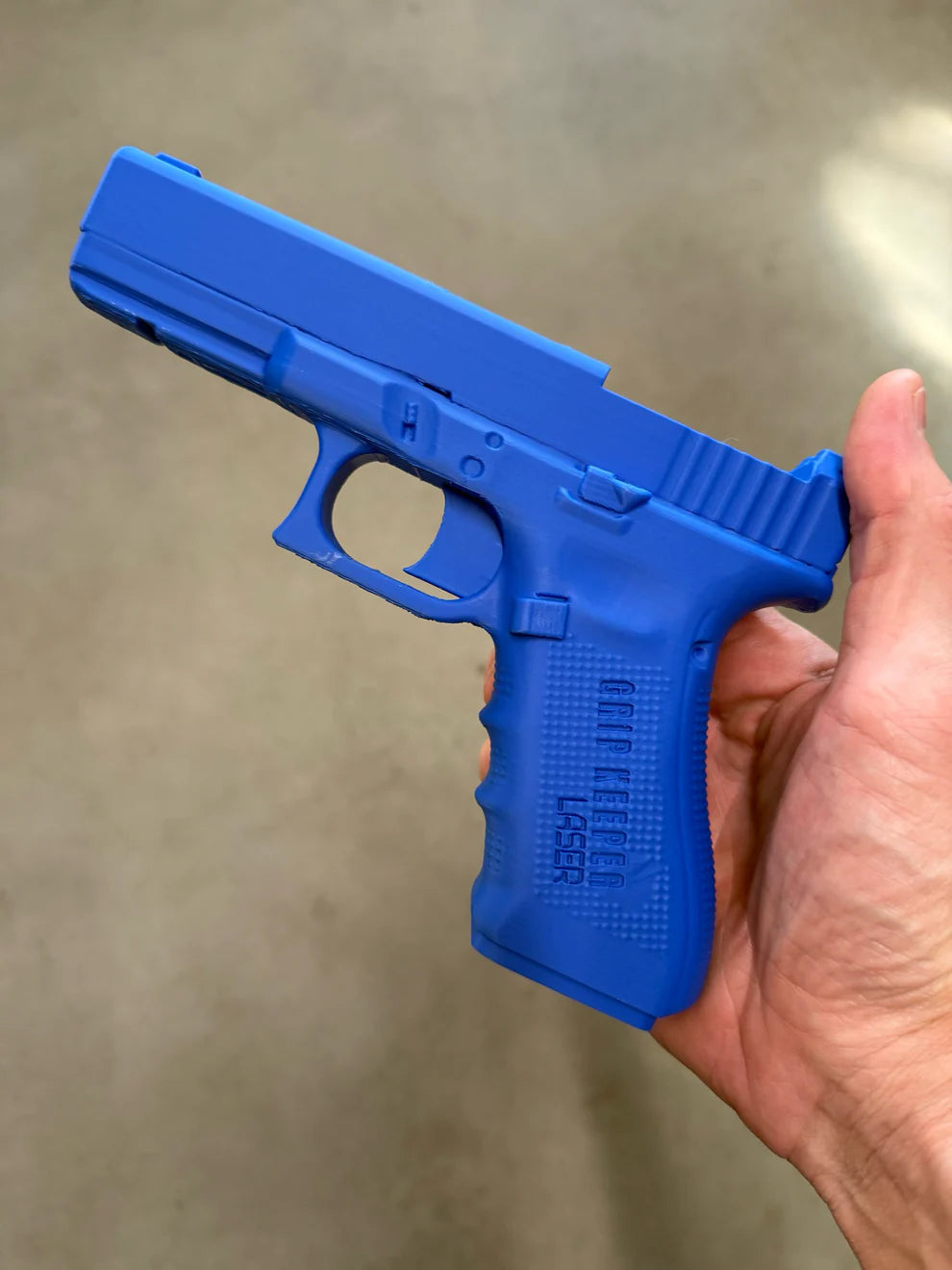 Grip Keeper Laser Trainer – Trigger-Activated Laser Training Pistol