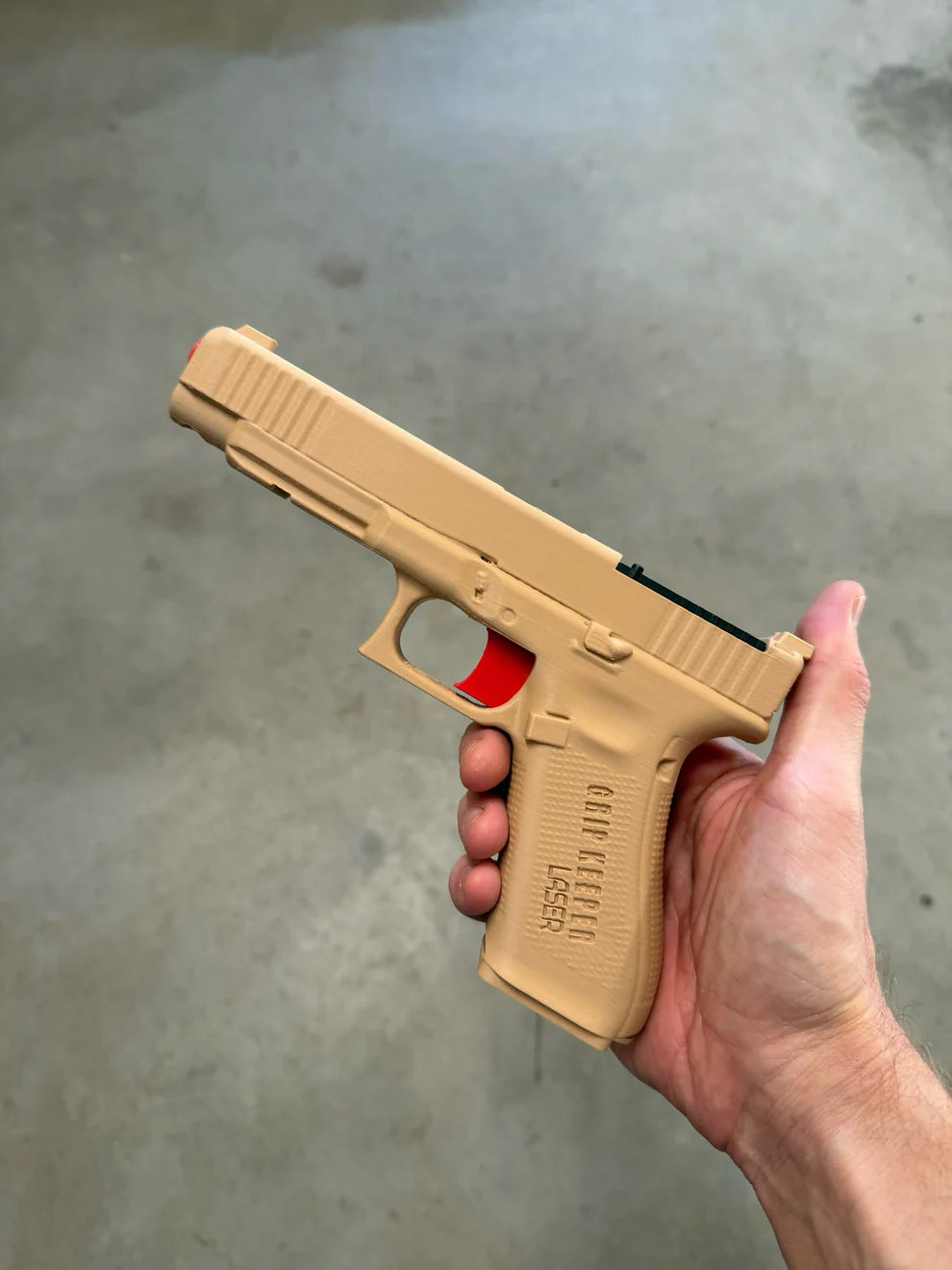 Grip Keeper Laser Trainer – Trigger-Activated Laser Training Pistol