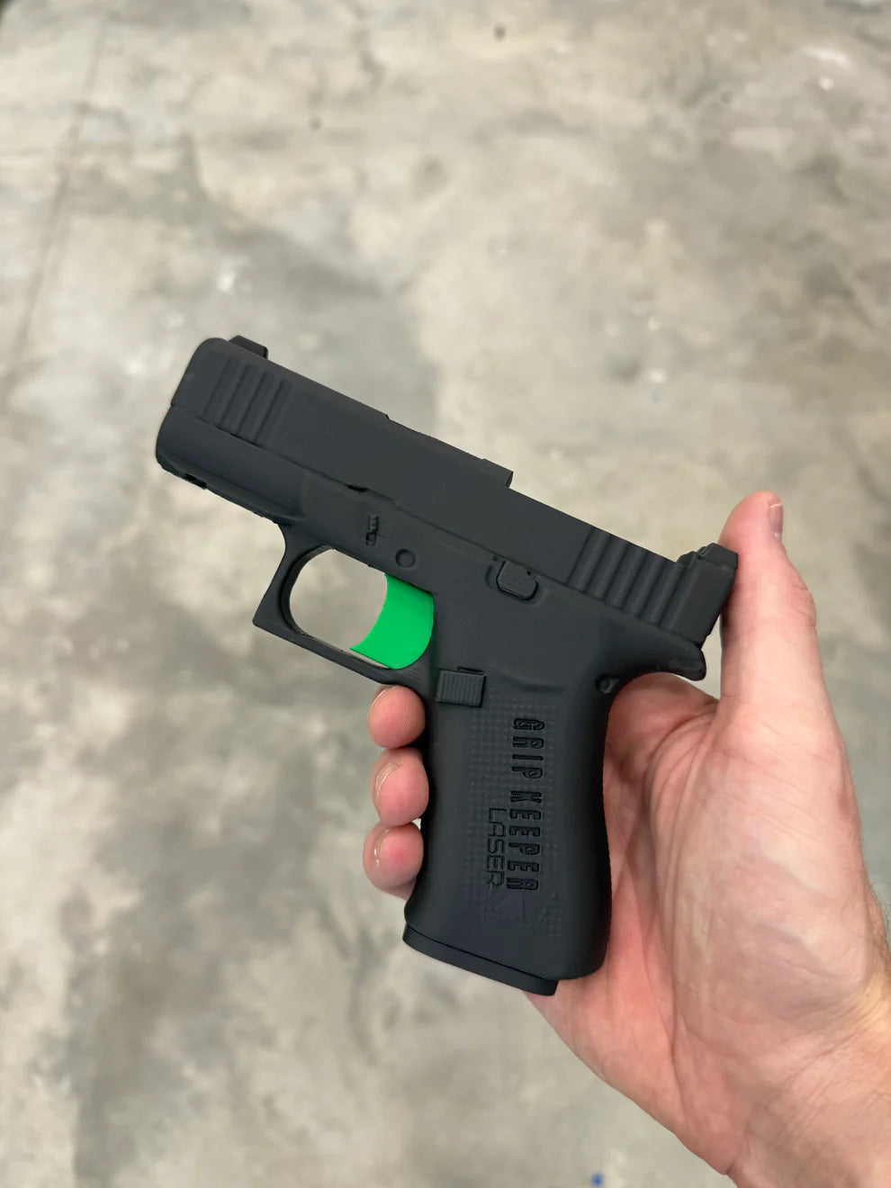 Grip Keeper Laser Trainer – Trigger-Activated Laser Training Pistol