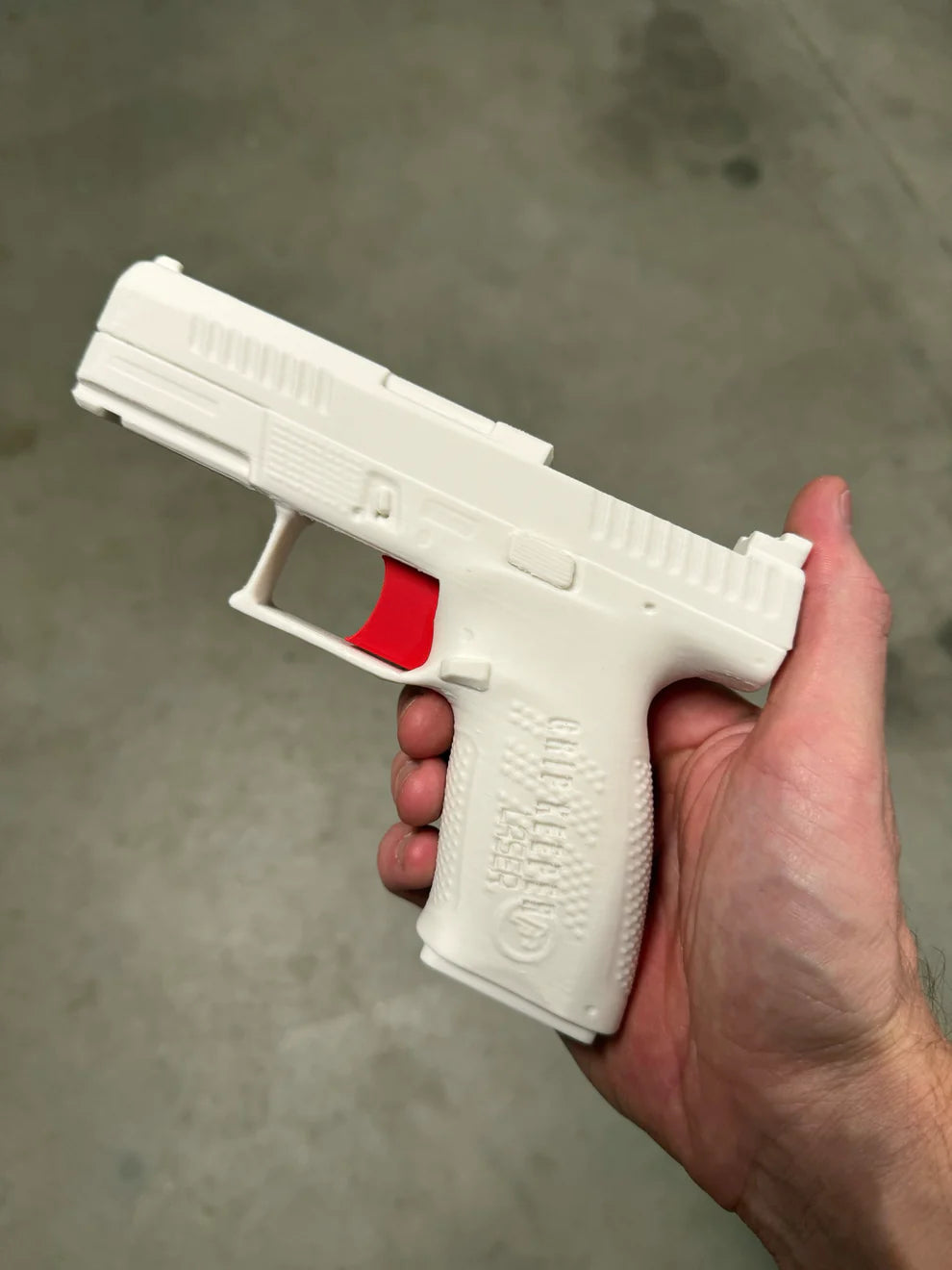 Grip Keeper Laser Trainer – Trigger-Activated Laser Training Pistol