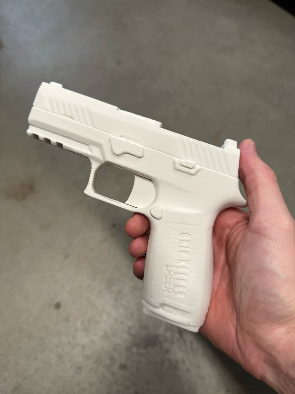 Grip Keeper Laser Trainer – Trigger-Activated Laser Training Pistol