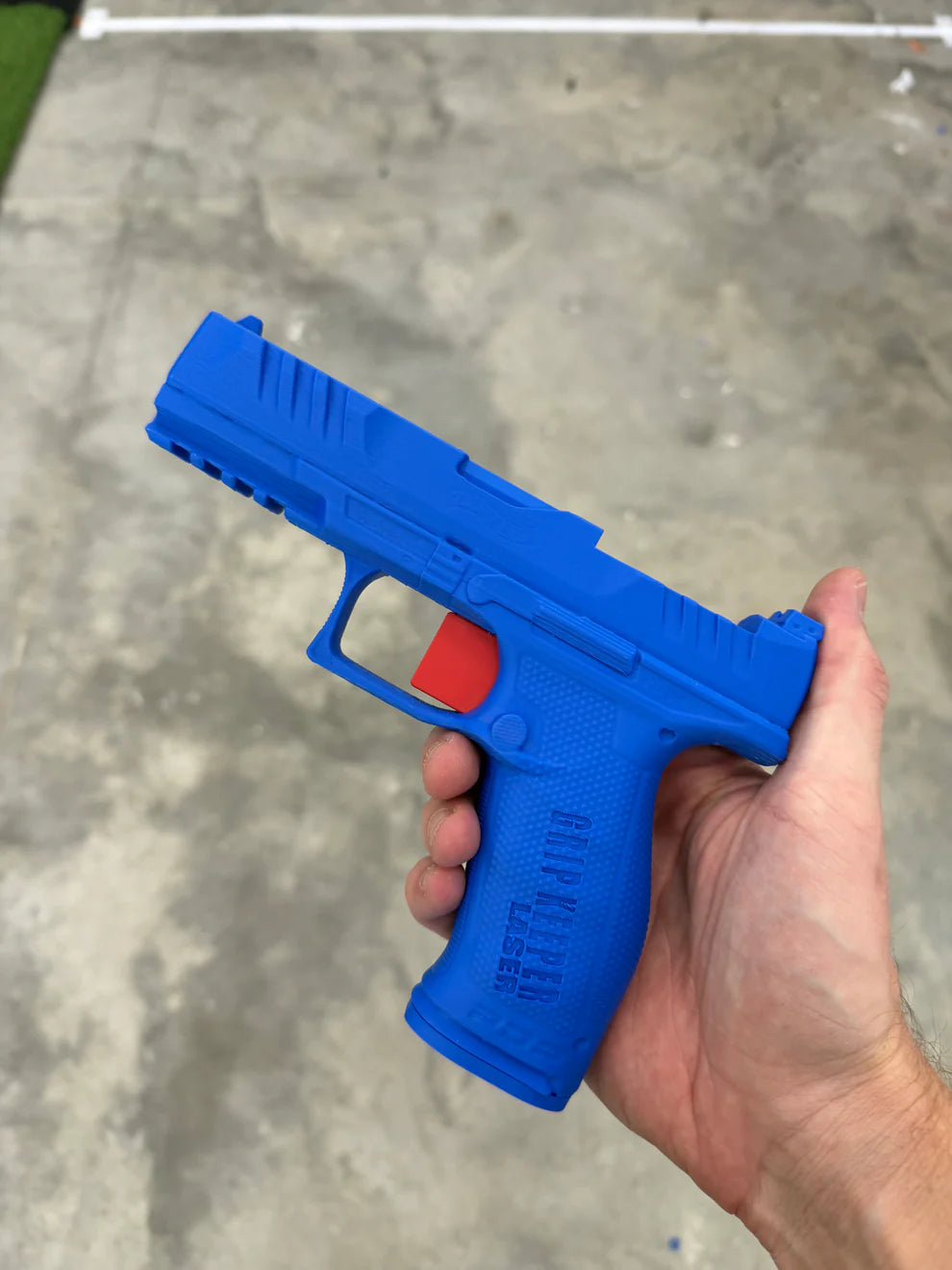 Grip Keeper Laser Trainer – Trigger-Activated Laser Training Pistol